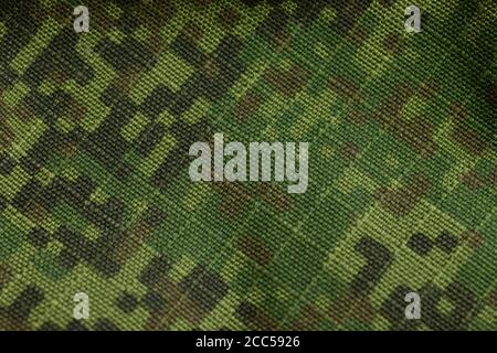 Green military textile texture. Army tissue cloth background Stock Photo