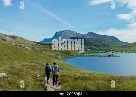 Mother and daughter hiking in Wester Ross, Scottish Highlands Stock Photo