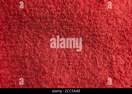 Red fabric cloth texture background. Textured surface Stock Photo