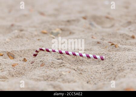 Plastic Pollution: Dropped straw. Bournemouth, UK. Stock Photo