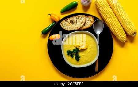 Traditional autumn spicy corn soup. Vegetarian cuisine.  Stock Photo