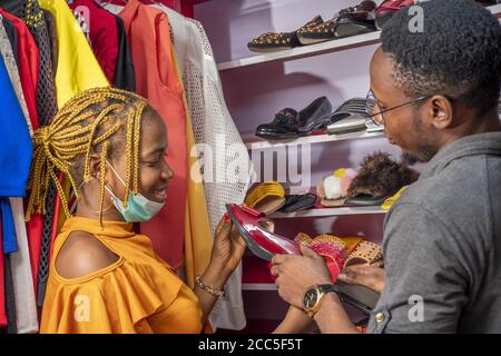 Young African couple shopping together in a fashion boutique Stock Photo