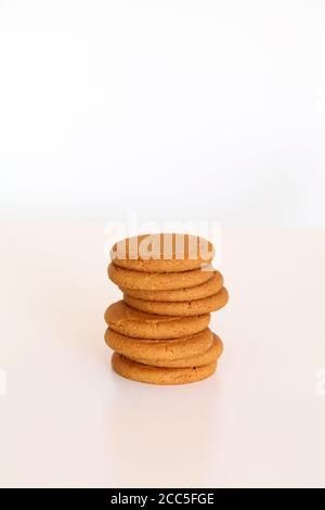 McVitie's Ginger Nuts biscuits stacked in a pile isolated on white background Stock Photo