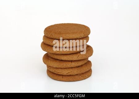 McVitie's Ginger Nuts stack of biscuits in a pile isolated on white background Stock Photo