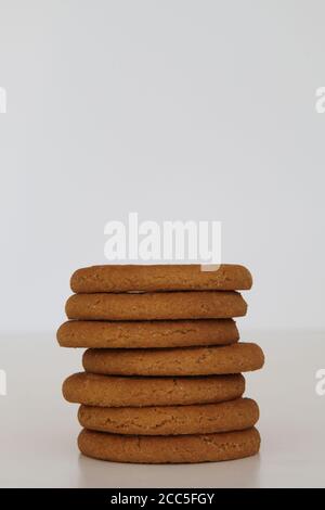 McVitie's Ginger Nuts stack of biscuits in a pile isolated on white background Stock Photo
