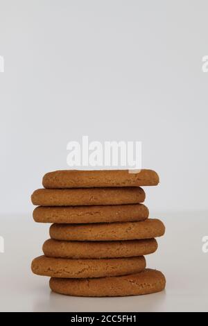 McVitie's Ginger Nuts stack of biscuits in a pile isolated on white background Stock Photo
