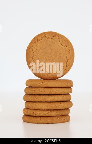 McVitie's Ginger Nuts stack of biscuits in a pile isolated on white background Stock Photo