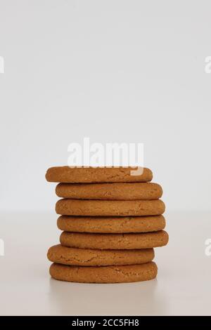 McVitie's Ginger Nuts stack of biscuits in a pile isolated on white background Stock Photo