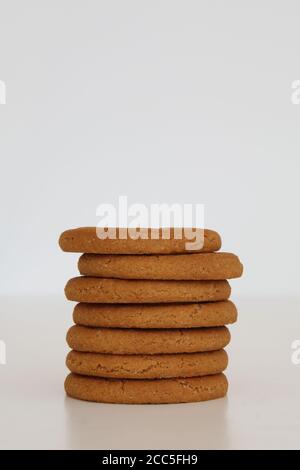 McVitie's Ginger Nuts stack of biscuits in a pile isolated on white background Stock Photo