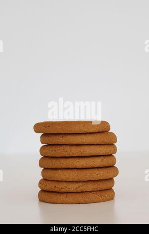 McVitie's Ginger Nuts stack of biscuits in a pile isolated on white background Stock Photo