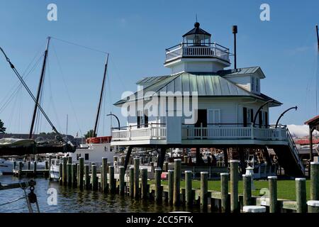 Hooper Strait Lighthouse, a screwpile lighthouse,  is on permanent display at the Chesapeake Bay Maritime Museum. Stock Photo