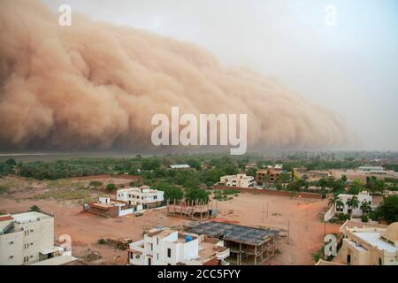 A haboob approaching the outskirts of Khartoum, Sudan. A haboob is a type of intense dust storm carried on wind that occur regularly in Sudan.