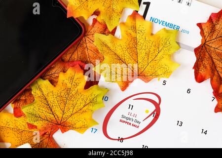 Single's day sale concept of China, 11.11. Calendar to remain 11.11 single's day sale with maple leaf Stock Photo