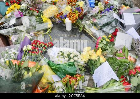 Stephen Lawrence Memorial Stone, Floral Tributes were laid for Stephan Lawrence in Well Hall Road as Gary Dobson and David Norris were sentenced for their part in his murder. Eltham, London. UK Stock Photo