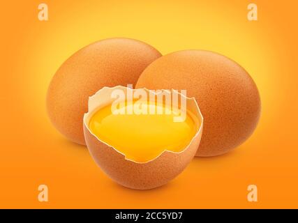Chicken eggs isolated on brown background Stock Photo