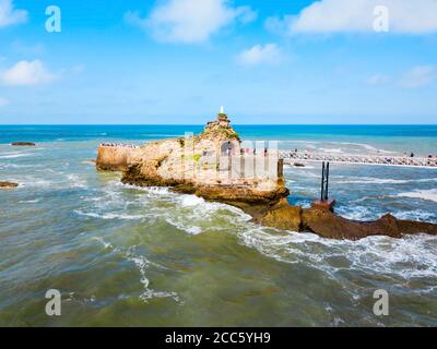 The rock of the Virgin or Le rocher de la Vierge is a tourist natural landmark in Biarritz city in France Stock Photo