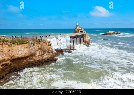 The rock of the Virgin or Le rocher de la Vierge is a tourist natural landmark in Biarritz city in France Stock Photo