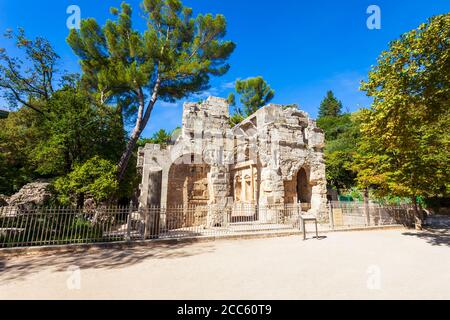 Diana temple is an ancient roman temple in Les Jardins de la Fontaine public park in Nimes city in southern France Stock Photo