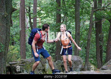 Young couple hiking in the Palatinate forest (Pälzerwald), Germany Stock Photo