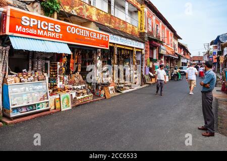 COCHIN, INDIA - MARCH 14, 2012: Market street with souvenir and spice shops in Fort Kochi in Cochin city, India Stock Photo