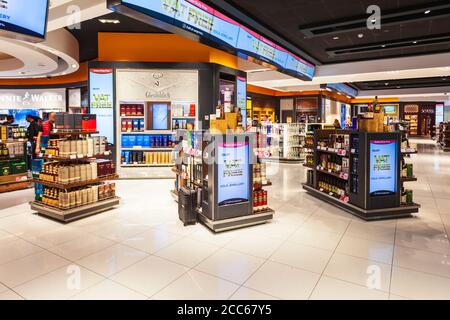 DUBAI, UAE - MARCH 02, 2019: Alcohol shop in the duty free zone in the Dubai International Airport in UAE Stock Photo