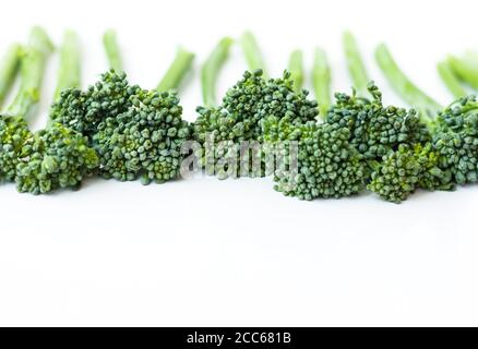 Fresh broccolini isolated on white background with copy space Stock Photo