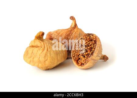 Two dried figs and helf isolated on white background Stock Photo