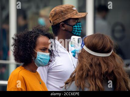 pic shows:   Temperature testing at the London Eye today  Monday 17th August 2020 (corrected)   Attractions have been open for a week but number and q Stock Photo