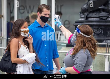 pic shows:   Temperature testing at the London Eye today  Monday 17th August 2020 (corrected)   Attractions have been open for a week but number and q Stock Photo