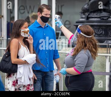 pic shows:   Temperature testing at the London Eye today  Monday 17th August 2020 (corrected)   Attractions have been open for a week but number and q Stock Photo