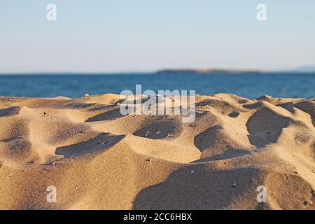 Tranquil empty sandy beach close up. Black sea coast. Stock Photo