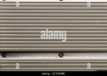 Metallic heatsink close up. Aluminum heatsink close up. Heat sink of an electronic device. Heatsink of graphic card.. Stock Photo