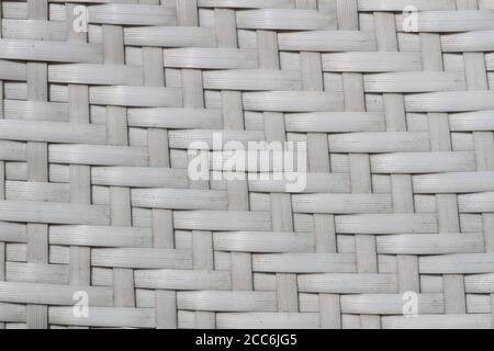 Straw mesh pattern made of plastic. Pattern made with durable and soft plastic strips. Stock Photo