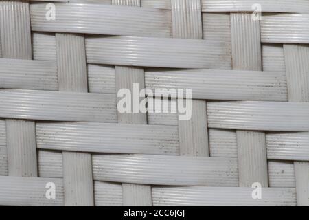 Straw mesh pattern made of plastic. Pattern made with durable and soft plastic strips. Stock Photo