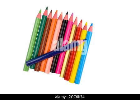 Blue colored wood pencil crayon placed on top of a line of different color pencils Stock Photo