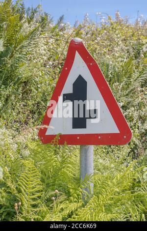 Staggered junction road sign Stock Photo - Alamy