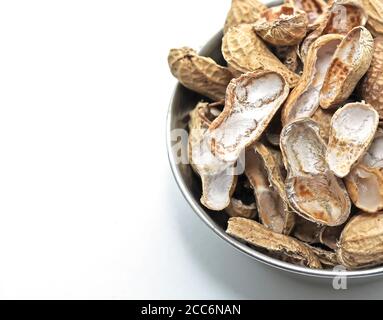 A bunch of Peanut shells on a white backgrounds Stock Photo
