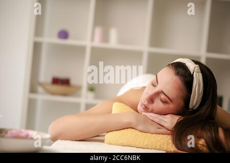 massage therapy. enjoying a massage in the spa Stock Photo