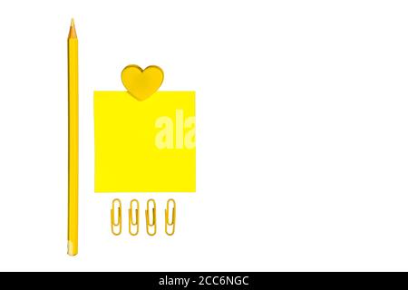 Yellow School Supplies Isolated on White Background. Stock Photo
