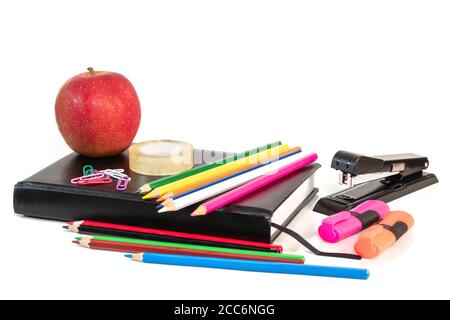 Back to school concept with colorful stationary over white background. Stock Photo