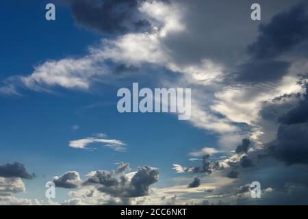 Black cloud and thunderstorm before rainy, Dramatic black cloud and dark sky Stock Photo