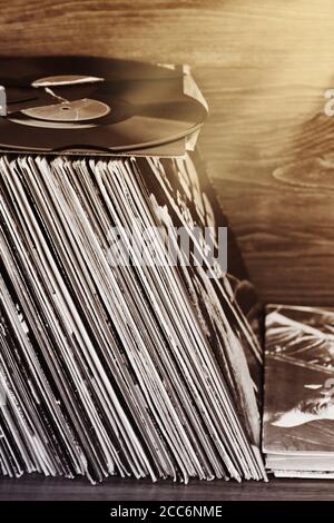 Derelict collection of the various vinyl musical records and old broken disk Stock Photo