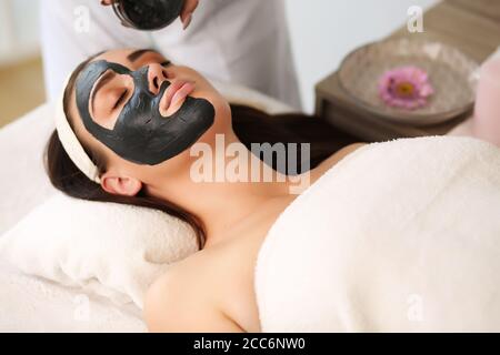 face care session at the spa center with a beautiful woman Stock Photo