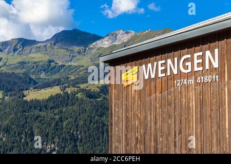 Wengen, Switzerland - August 22, 2015 - Sign of Railway station Wengen under the famous peak of swiss alps - Jungfrau, Wengen, Switzerland Stock Photo