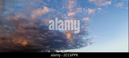 panorama of the red clouds at sunset, soft focus Stock Photo