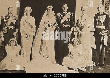 1934 - UK Royal Group portrait at the marriage of Prince George, Duke of Kent & Princess Marina of Greece & Denmark in Westminster Abbey, London.Their wedding was the first royal wedding ceremony to be broadcast by wireless and using microphones and loud speakers. Her dress was designed by designed by Edward Molyneux. Their 1st home was at 3 Belgrave Square.  The Princess was widowed in 1942, when her husband was killed in a plane crash on active service.