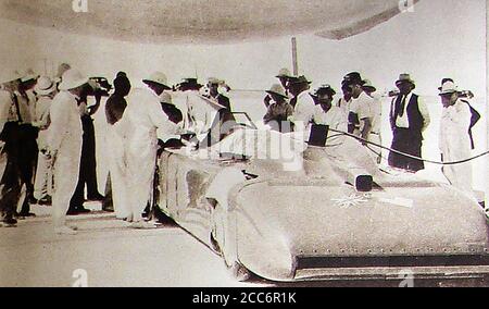 September 1935 - Sir Malcolm Campbell's ( 1885-1948) 'Bluebird' record braking racing car being refuelled at Bonneville Flats, Utah, USA,  where on the 3rd of  September 1935, Campbell became the  first person to drive an automobile over 300 mph. Campbell unsuccessfully  stood for Parliament at the 1935 general election in Deptford as a Conservative Party candidate. He is also said to have had links to the British Union of Fascists and to have once flown a swastika flag from his own private car. Campbell eventually died of natural causes (Stroke in 1948) Stock Photo