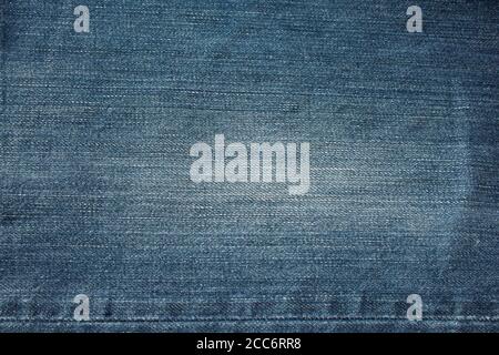 blue frayed denim jeans background Stock Photo