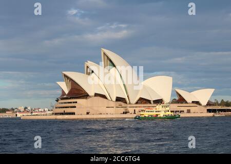 AUSTRALIA, SYDNEY, SYDNEY HARBOUR, BENNELONG POINT, JULY 31, 2016: The ferry 'FISHBURN' passes the Sydney Opera House Stock Photo