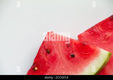 Two slices of ripe watermelon on white background, top view Stock Photo